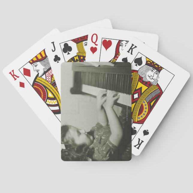 Mädchen, das Klavier spielt Spielkarten (Rückseite)