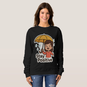 Mädchen im Regen, aber mit einem Lächeln. Sweatshirt