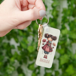 Mädchen mit einer Froschpuppe Niedlich Whimsical Schlüsselanhänger