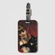 Mädchen mit einer schwarzen Katze in ihren Armen