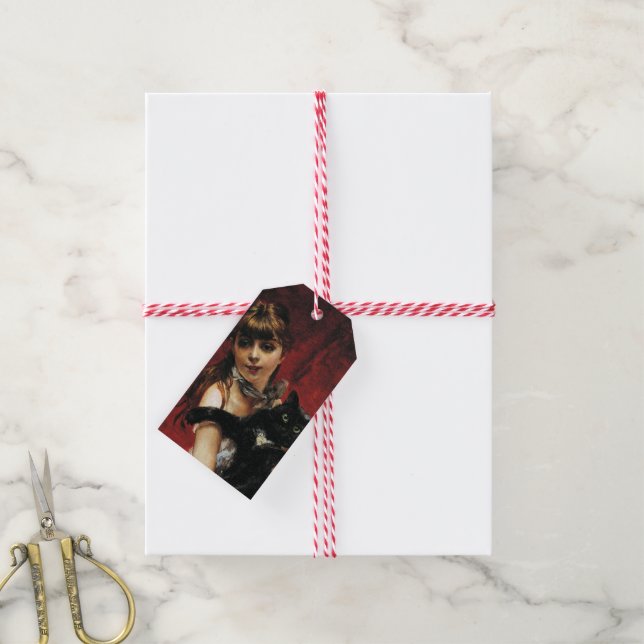Mädchen mit einer schwarzen Katze in ihren Armen Geschenkanhänger (Mit Garn)