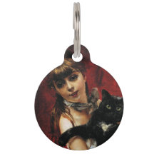 Mädchen mit einer schwarzen Katze in ihren Armen