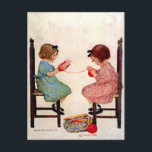 Mädchen mit Garn Postkarte<br><div class="desc">In dieser Geschichtenbuch-Illustration,  von Jessie "Willcox Smith,  helfen sich zwei kleine Mädchen dabei,  Garnbälle zu machen.

Jesse Willcox Smith,  1863-1935,  war in Philadelphia geboren. Sie war eine amerikanische Illustratorin,  berühmt für ihre Arbeit in Zeitschriften wie Ladys Zuhause Journal und für ihre Illustrationen für Kinderbücher.</div>