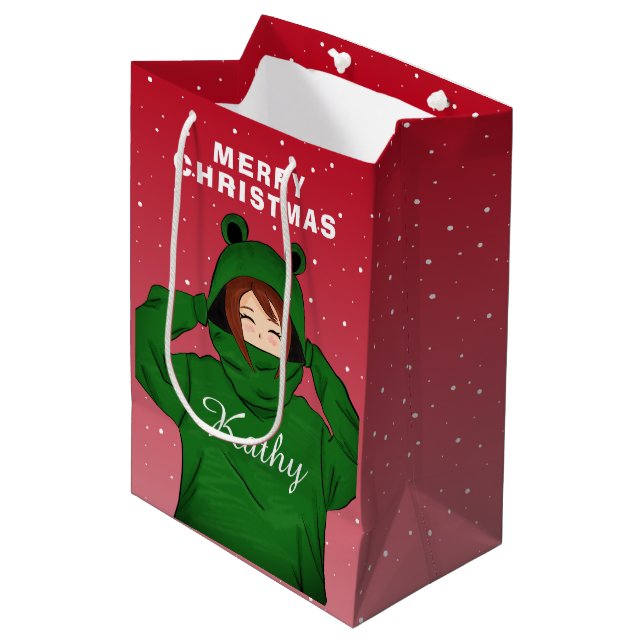 Mädchen mit Green Frog Hoody Zeichnend Weihnachten Mittlere Geschenktüte (Vorderseite Schrägansicht)