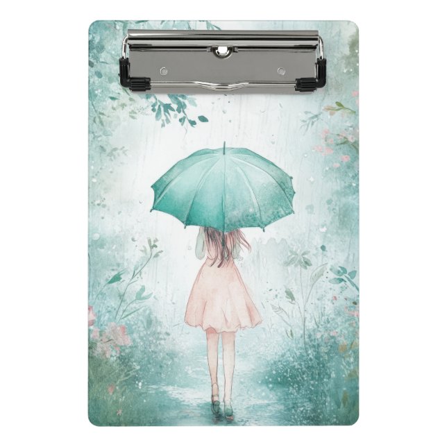 Mädchen mit türkisfarbenem Regenschirm im regneris Mini Klemmbrett (Vorderseite)
