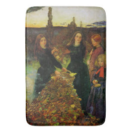 Mädchen sammeln Herbstblätter für ein Feuerbrand Badematte