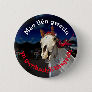 Mae llên gwerin yn gwrthsefyll fasgag button