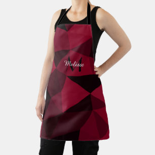 Magenta rosa rotes Schwarz Geometrie-Muster Monogr Schürze