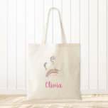 Magischer Regenbogen Einhorn Personalisiert Tragetasche<br><div class="desc">Niedliche personalisierte Einhorngeburtstüte. Dieses lustige Design zeichnet sich durch eine süße Einhorn-Illustration,  Sterne und einen Regenbogen aus. Trendrosa,  lila,  blaue und gelbe Farbtöne mit einer Touch von Imitaten goldenen Glitzer.</div>