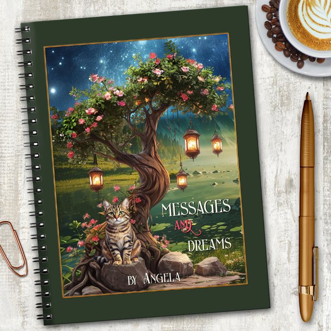 Magisches Dream Cat Night Notebook Notizblock (Magical notebook featuring a cute tabby cat sitting under a lantern-lit tree at night)