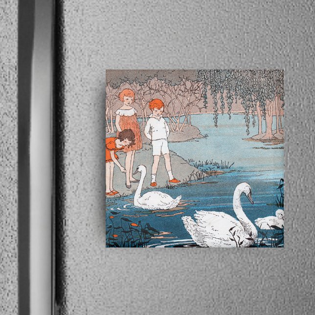 Magnet für Kinder und Schwäne (Children red hair at shore of blue lake feeding pretty white swans on square magnet.)