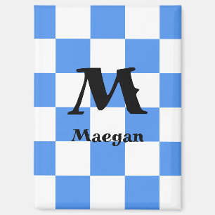 Magnet mit blauem karierten Hintergrund