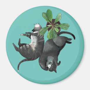 Magnet  Zwei Katzen liegen bei einer Pflanze