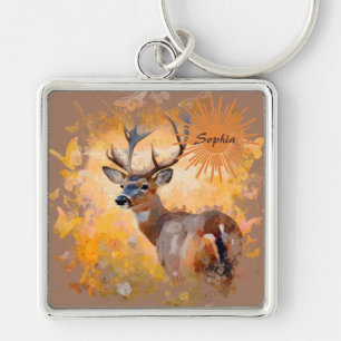 Majestätischer Hirsch auf einem Feld mit Wildblume Schlüsselanhänger