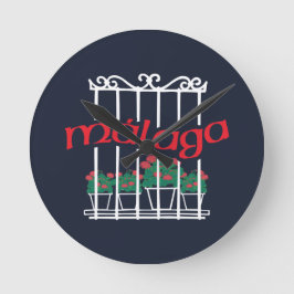 Malaga, Fenster mit Blumen Runde Wanduhr