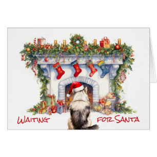 Malamute Hund warten auf Weihnachts-Feuerplatz