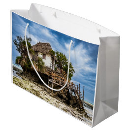 Malerisches Haus auf einem tropischen Korallenriff Große Geschenktüte