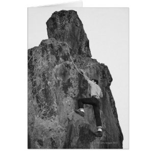 Man Rock Climbing