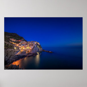 Manarola-Stadt in den Cinque Terre am Abend Poster