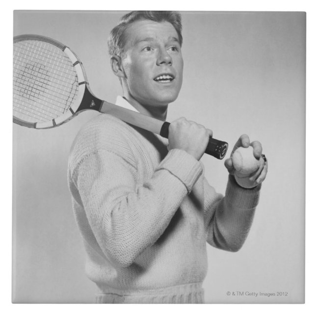 Mann hält Tennisschläger Fliese (Vorderseite)