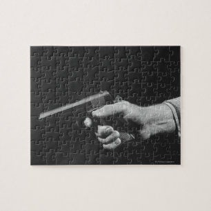 Mann mit Waffe Puzzle