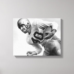 Mann spielt Fußball Leinwanddruck