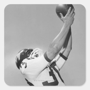 Mann spielt Fußball Quadratischer Aufkleber