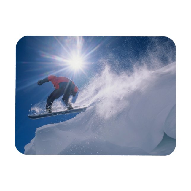 Mann springt von einer großen Ecke auf einem Snowb Magnet (Horizontal)