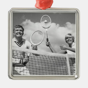 Mann und Frau, die Tennis spielen Silbernes Ornament