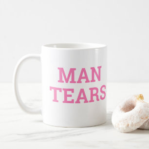 MANN ZERREISST TASSE