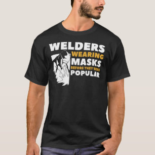 Männchen Welders tragen Masken, bevor sie Popula w T-Shirt