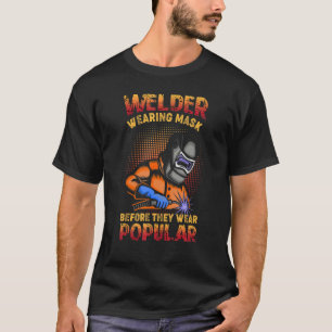 Männchen Welders tragen Masken, bevor sie Popula w T-Shirt