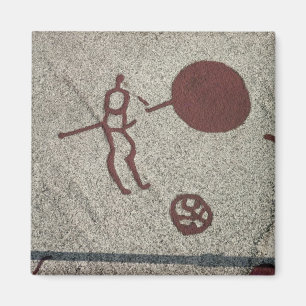 Männliche Figur mit Sonne Magnet