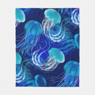 Many blue jellyfishes swimming underwater. Seamles Fleecedecke