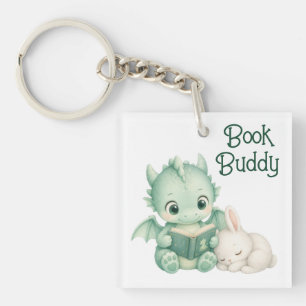 Märchenbuch-Baby-Drache liest mit Häschen Schlüsselanhänger