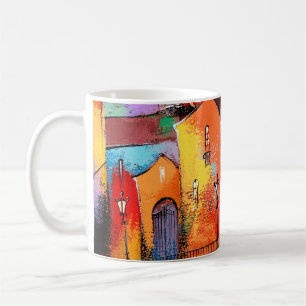 Märchenstadt in orangefarbener Farbe. Foto aus Acr Kaffeetasse