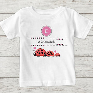 Marienkäfer fügen Namen schwarz und pink hinzu Baby T-shirt