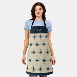 Marineblau-Kompass und Monogram-Zuhause an der Bei Schürze