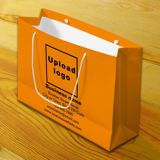 Markenbezeichnung für orange farbige Großverpackun Große Geschenktüte (Build brand name awareness. Your business brand on orange color large gift bag.)
