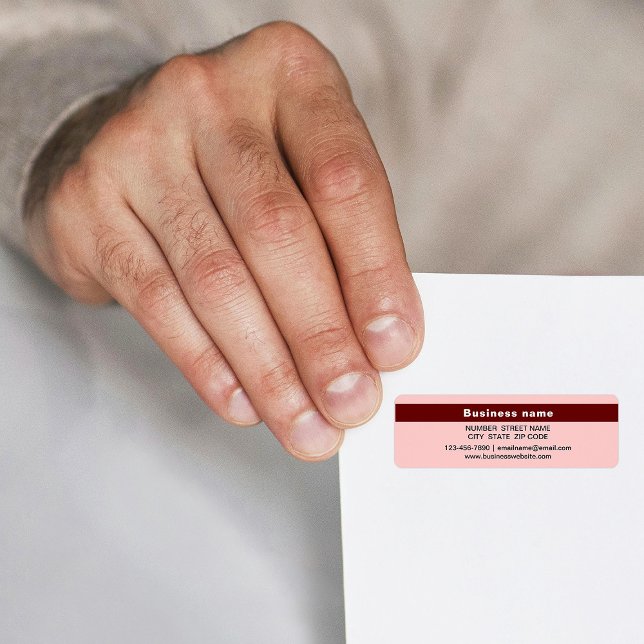 Markierter Markenname auf hellroter Rücksendeadres (Light red return address label with your highlighted business name)