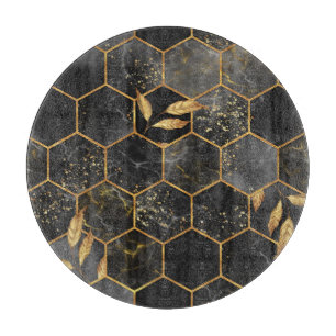 Marmor-Sechseck, Textur mit goldenen Blättern. Schneidebrett