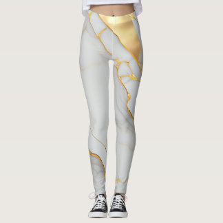 Marmormatte aus weißem und goldfarbenem Foil Leggings