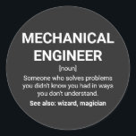 Maschinenbauingenieur - Funny Definition Runder Aufkleber<br><div class="desc">Mechanischer Ingenieur Funny Definition: Jemand, der Probleme löst, von denen man nicht wusste, dass man sie hatte, auf eine Weise, die man nicht versteht. Siehe auch: Zauberer</div>
