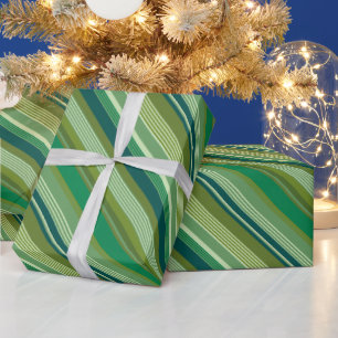 Medley aus grünen warmen und kühlen Streifen Geschenkpapier