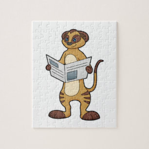 Meerkat bei Reading a Newspapier Puzzle
