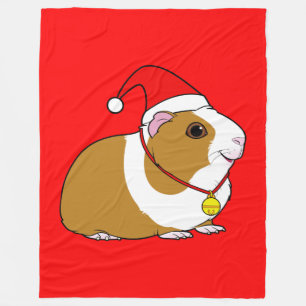 Meerschweinchen in der Weihnachtsmannmütze und in Fleecedecke