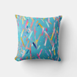 Mehrfarbiger Konfetti-Hintergrund auf blau Kissen