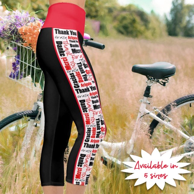 Mehrsprachiger Dank für Typografie Vertikale Strei Capri Leggings (A red and black thank you word cloud over white dominates the sides of these capri style leggings.)