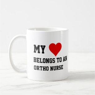 Mein gehört einer Ortho-Krankenschwester  Kaffeetasse