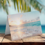 Mele Kalikimaka Beautiful Beach Weihnachten<br><div class="desc">Diese hübschen Weihnachtskarten am Meer bieten eine wunderschöne Küstenlandschaft bei Sonnenaufgang mit einer schönen Typografie,  die Mele Kalikimaka lautet. Eine niedlich hawaiianische Art,  frohe Weihnachten im Stil zu sagen. Bring mich in diesem Urlaub an den Strand.</div>